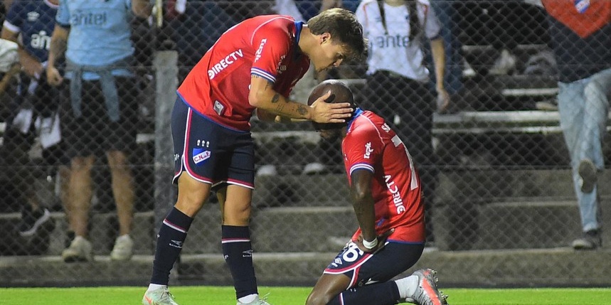 Nacional terminó pidiendo la hora pero le ganó a Racing y escala